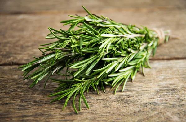 Rosemary bound on a wooden board