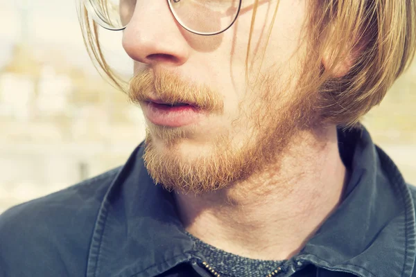 Closeup of man with red beard