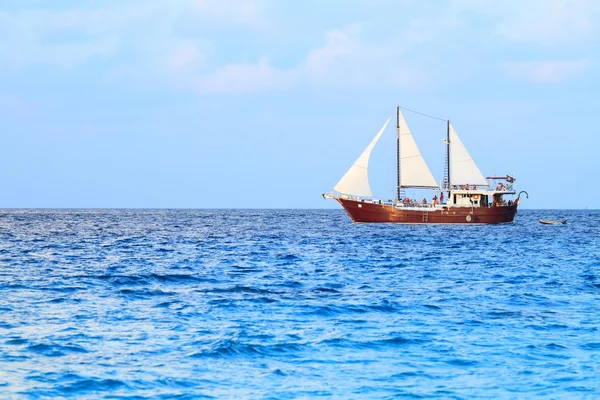 Ship in open blue sea