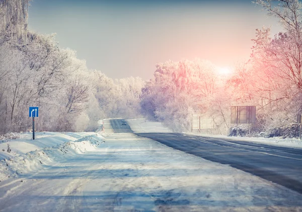 Winter landscape with a highway.