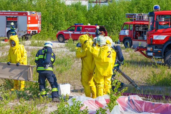 CZECH REPUBLIC, PLZEN, 4 JUNY, 2014: Fire departments and emergency teams in hazmat suits.