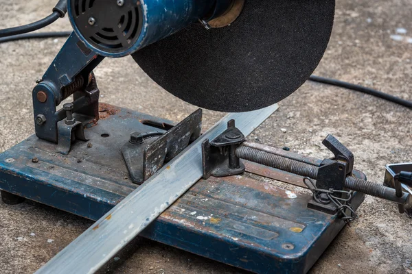 A triangle metal and steel with compound mitre saw