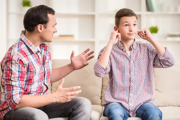 Father and son at home