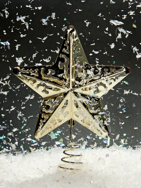 Christmas star with falling snow