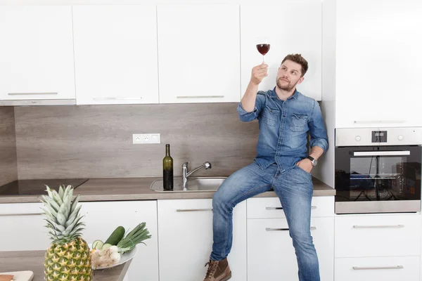 Young man with wine.