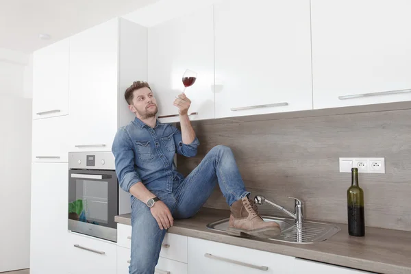 Young man with wine.