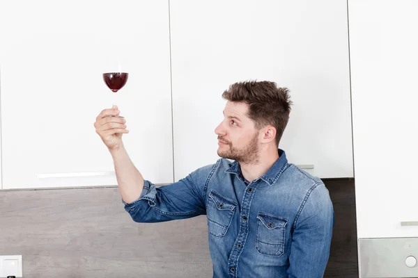 Young man with wine.