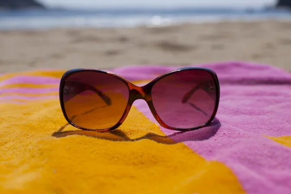 Sunglasses on beach