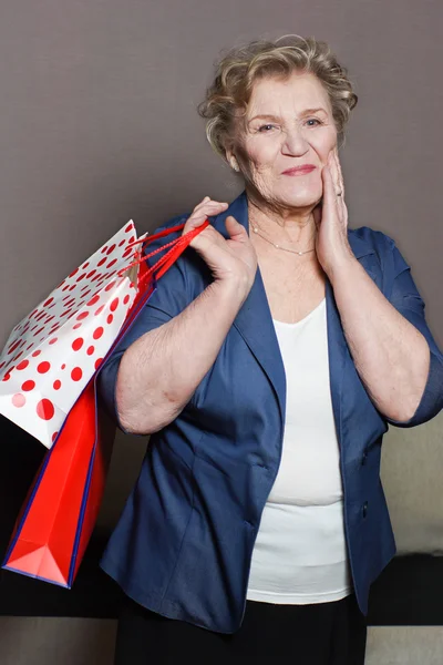 Old woman with her shopping