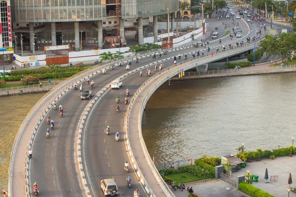 Ho Chi Minh City, Vietnam - March 08 2015 : Traffic at curves of Khanh Hoi Bridge at downtown of Saigon, Vietnam. Ho Chi Minh city is the biggest city in Vietnam.