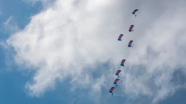 CORNWALL, ENGLAND, UK - JUNE 10,2016 : RAF Falcons Parachute Team at Royal Cornwall