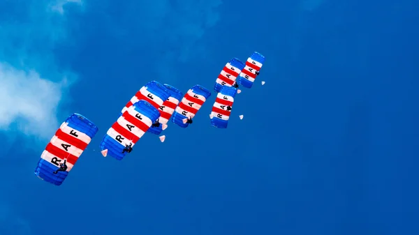 CORNWALL, ENGLAND, UK - JUNE 10,2016 : RAF Falcons Parachute Team at Royal Cornwall