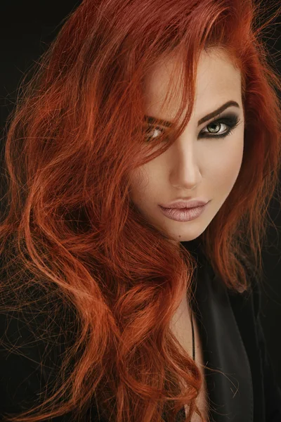 http://st2.depositphotos.com/3695509/5337/i/450/depositphotos_53375021-stock-photo-glamorous-red-hair-women.jpg