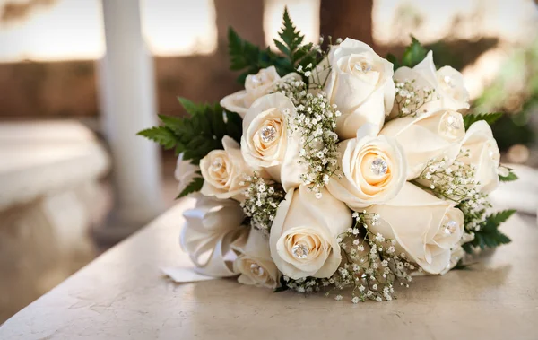 White wedding bouquet in sepia tones