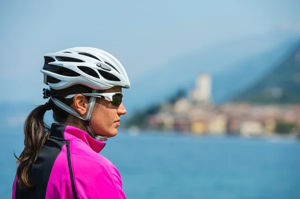 Bike girl portrait - woman with bike helmet
