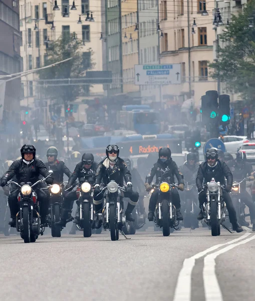 Group of bikers on old fashioned motorcycles