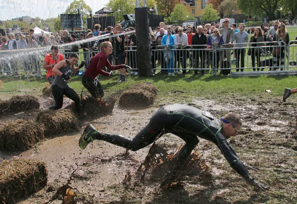 Man is about to fall and group of woman running