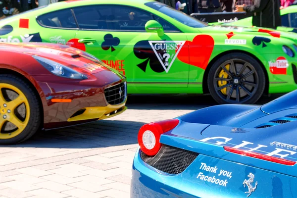 Colorful sports-cars before the start of the public event Gumbal