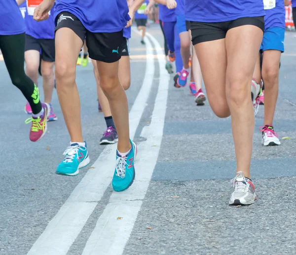 Group of colorful running feet and legs
