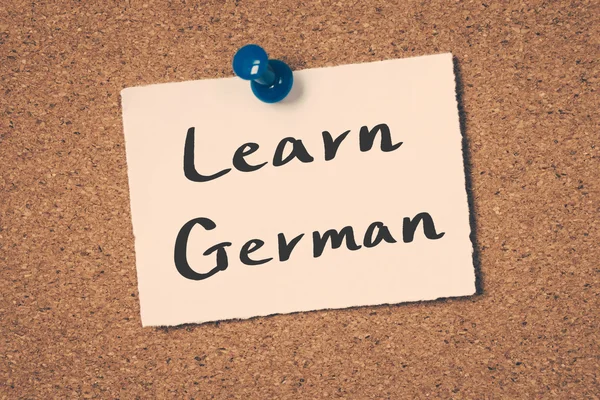 Learn German note pin on the bulletin board