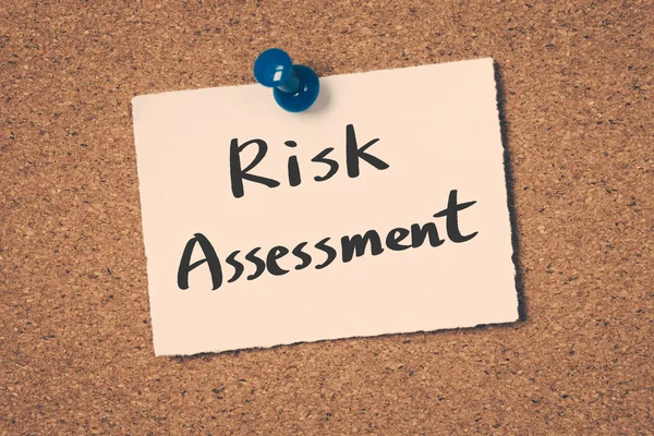 Risk Assessment note pin on the bulletin board