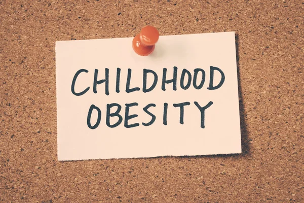 Childhood obesity note pinned on the bulletin board