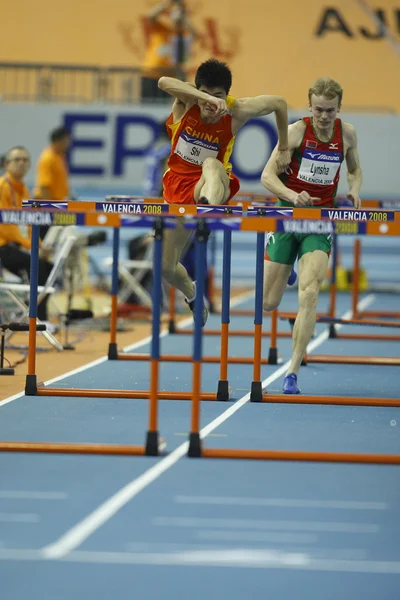 Dongpeng Shi of China compete in the Mens 60 Metres Hurdles Heat