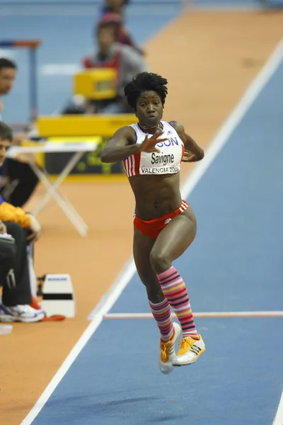 Yargelis Savigne competes in the Womens Triple Jump Final
