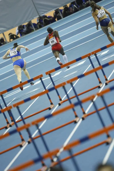 Josephine Onyia (C) competes Women\'s 60 metres hurdles