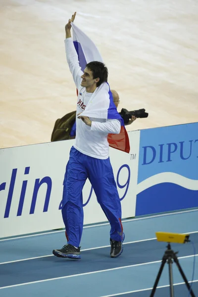 Evgeniy Lukyanenko celebrates the gold medal in Men\'s pole vault