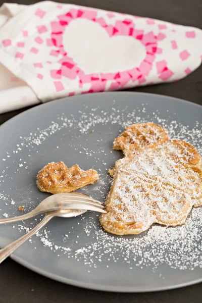 Hot waffle with powdered sugar