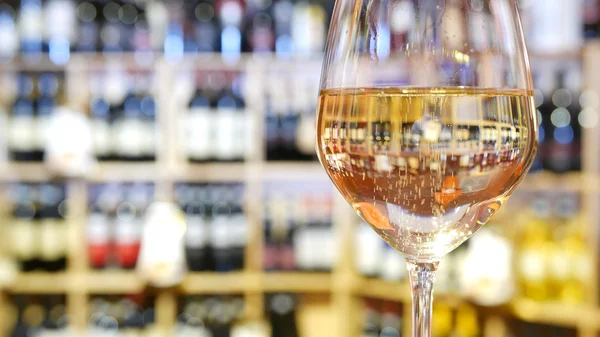 White wine glass in an Italian wine bar.