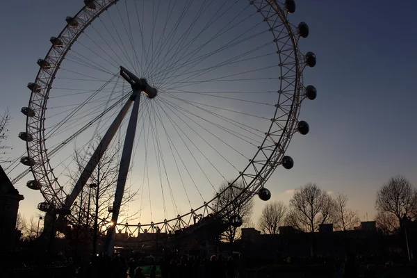 London Eye in Waterloo, London - February 15th of 2015: This is the third largest ferris wheel all around the world. This tourist attraction is 135 meters tall with a diameter of 120 metres.