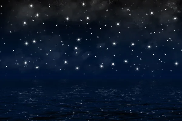 Dark blue night sky over sea with nebula and shiny stars