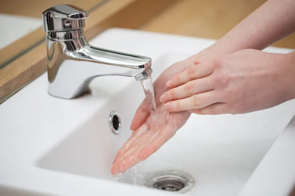 Woman washing Hands. Cleaning Hands