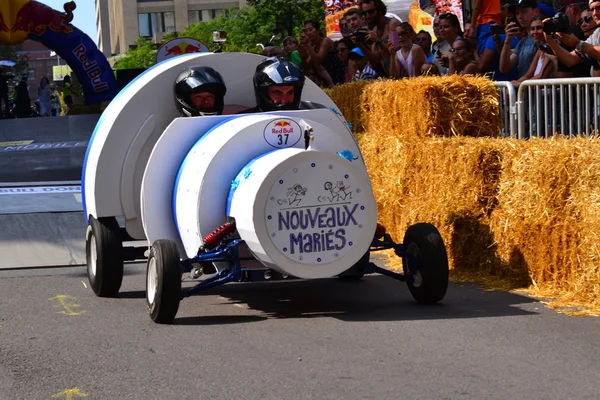 Montreal, Canada - September 06, 2015: Montreal Red Bull Soapbox Race in Montreal Downtown.A lot of fun and ingenious ideas.Number 37-Nouveaux maries Quebec team.