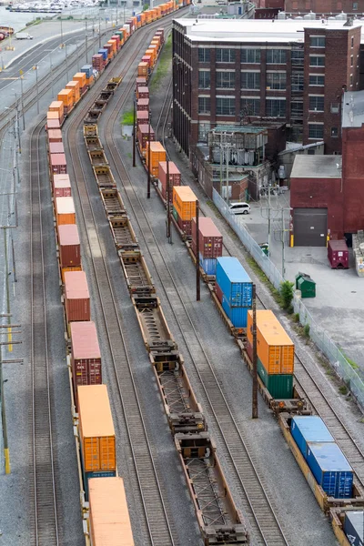 Montreal, Canada - June 07, 2015: Three trains carrying containe