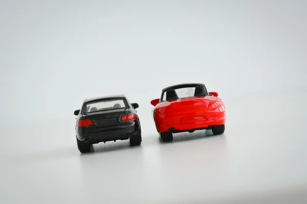 Red and black toy cars