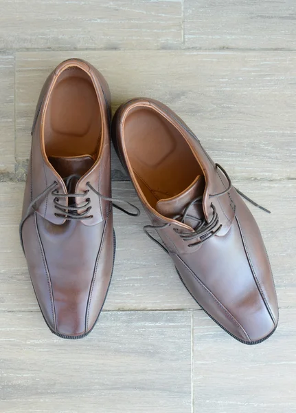 Gentleman shoes on wood