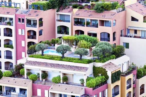 Colorful apartments with roof gardens, balconies and patios