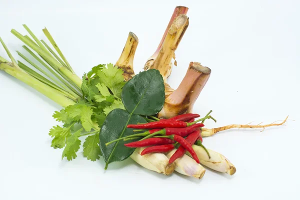 Lemongrass, lime leaves, chilli, lemon, Fresh herbs and spices asian ingredients food on wood background.