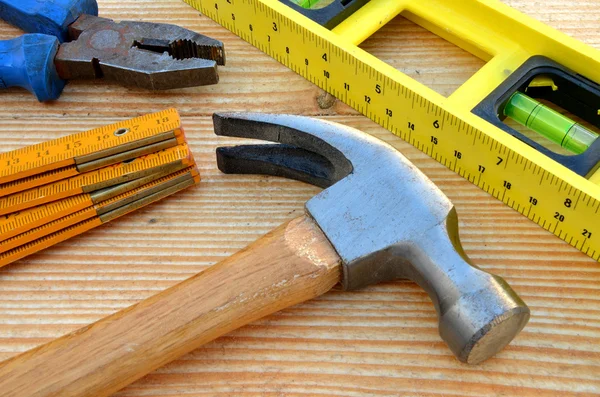 Claw hammer, carpenter meter, water-level and pliers