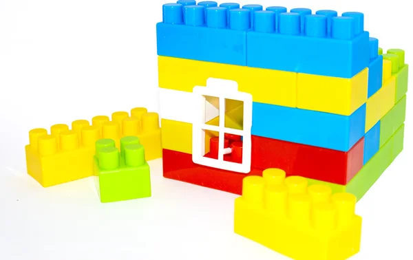 House building from lego bricks on a white background