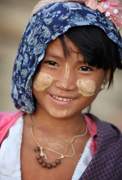 An unidentified smiling Burmese girl