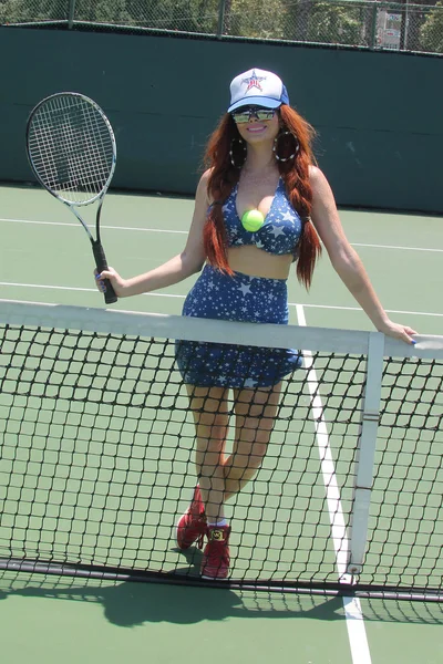 Phoebe Price playing tennis