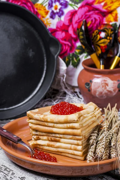 Pancakes with salmon caviar