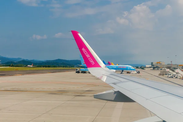Aircraft Wizz Air aviation company at the airport of Bergamo.