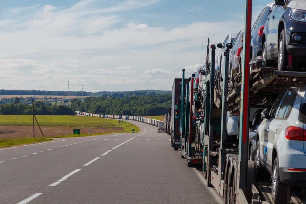 Automotive queue on the road.