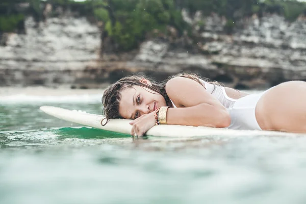 Beautiful woman  in the ocean surf