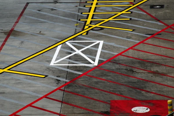 Road markings for the aircrafts at an international airport, abstract concept for logistics, transport and air travel
